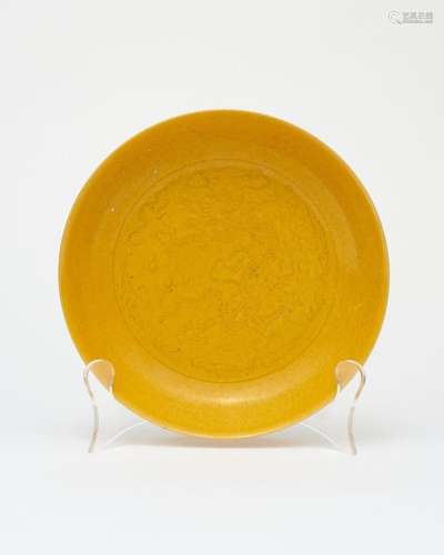 A yellow-glazed 'dragon' plate Qianlong six-characte...