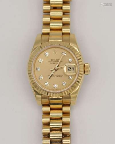 A lady's Rolex Oyster Perpetual Datejust 18kt yellow gold di...