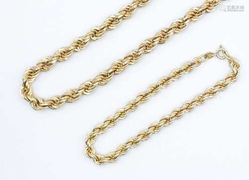 A 10kt yellow gold rope necklace and matching bracelet.