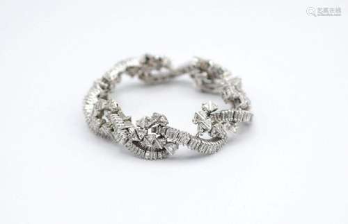 A lady's contemporary platinum diamond bracelet