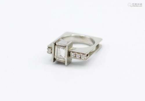 A lady’s 18kt white gold and diamond ring in a contemporary ...