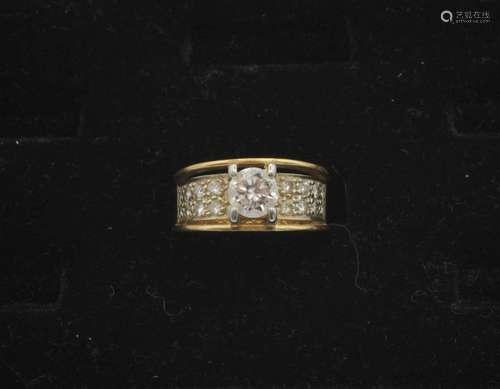 A lady's 18kt yellow and white gold diamond ring