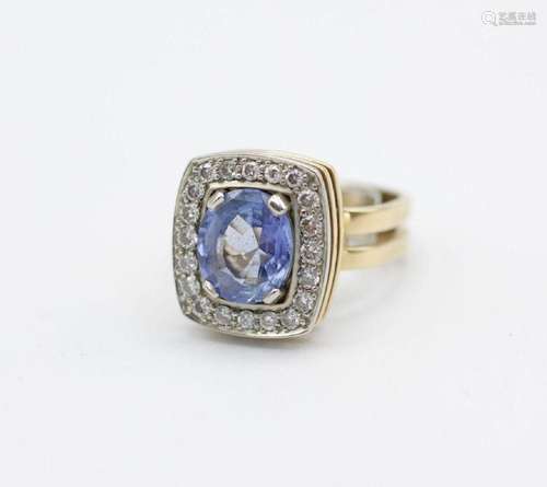 A lady’s 18kt yellow and white gold, sapphire, and diamond r...