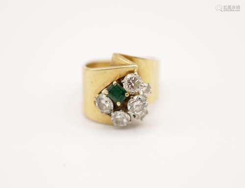 A lady’s custom made diamond and emerald cocktail ring in 18...