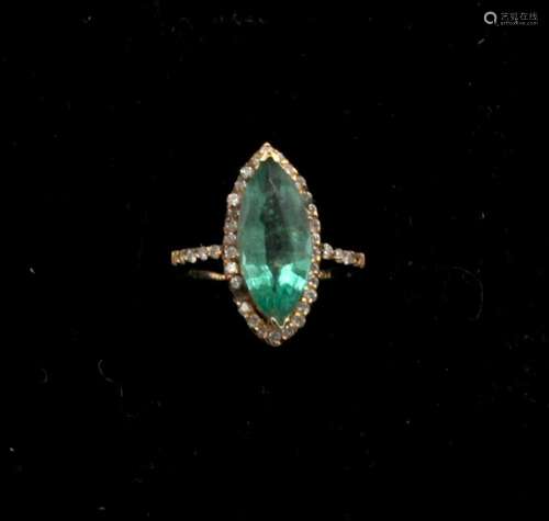 A lady's 14kt yellow gold, emerald, and diamond ring, total ...