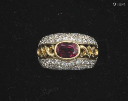 A lady’s 18kt yellow gold, ruby, and diamond cocktail ring