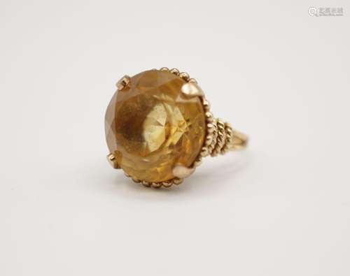 A lady's citrine and 14kt yellow gold ring