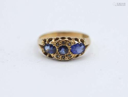 A lady's gold and sapphire ring