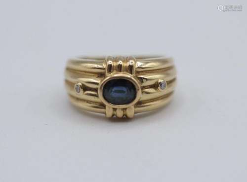 A lady’s 18kt yellow gold and sapphire ring