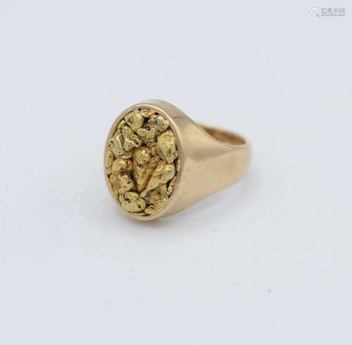 A men’s 14kt yellow gold ring, having an oval panel set with...