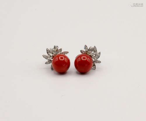 A pair of coral and diamond earrings in 10kt white gold