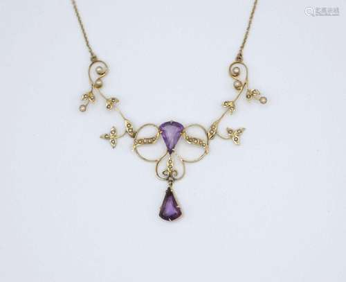 An Edwardian lavalier necklace in 14kt yellow gold