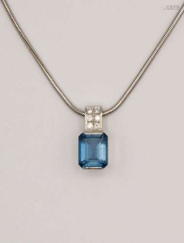 A lady’s 18kt white gold, blue topaz, and diamond pendant