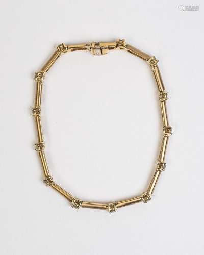 A lady's 14kt yellow gold and moissanite bracelet,