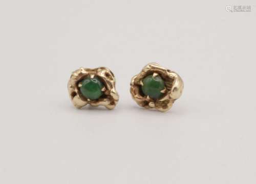 A pair of small jadeite earrings in 18kt yellow gold