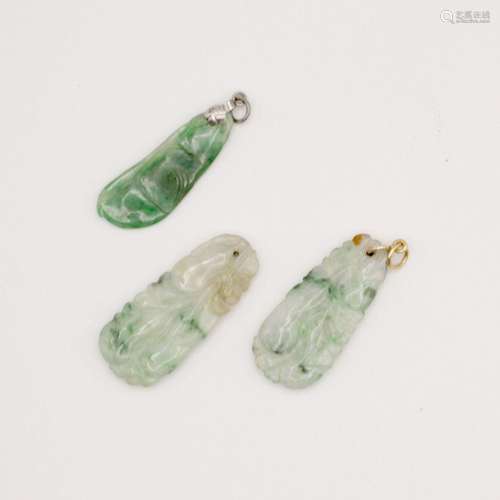 A pair of carved Chinese jadeite pendants