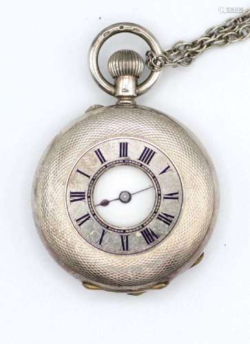 A .935 silver half hunter-cased pocket watch