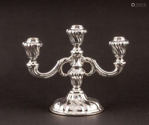 A German sterling silver three branch candelabra.