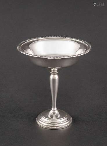 A sterling silver pedestal bowl.