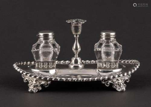 An electroplated silver ink stand-dish.