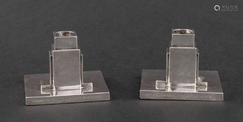 A pair of Art Deco "Sky Scraper" silver candlehold...