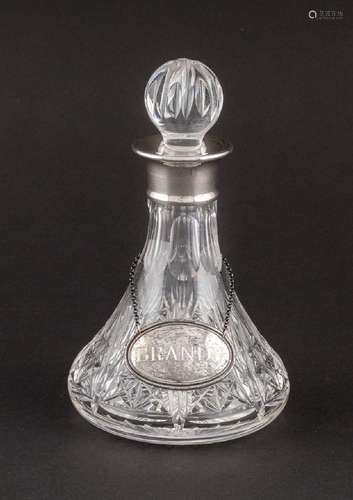 A sterling silver mounted cut glass brandy decanter and stop...