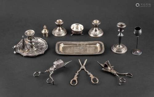 A sterling silver candlestick together with plated snuffers,...