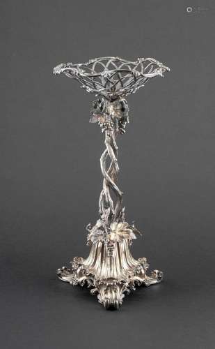 A Victorian silver plated centrepiece having a rococo base 1...