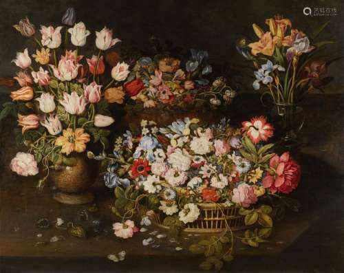 Still life of tulips and an apothecary`s rose in a stoneware...