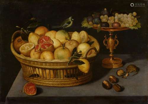 Still life of lemons and pomegranates in a basket with a blu...