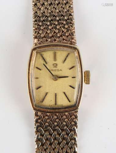An Omega 9ct gold lady's bracelet wristwatch, the curved rec...