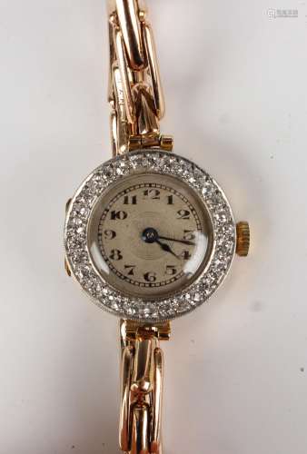 An 18ct gold cased and diamond set lady's dress wristwatch, ...