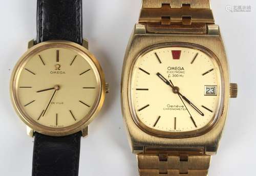 An Omega Electronic F300 Hz gilt metal and steel backed gent...