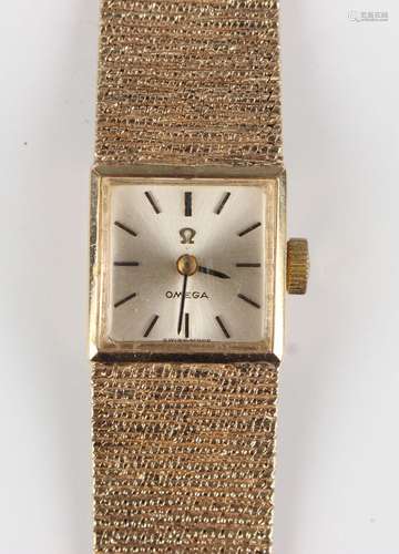 An Omega 9ct gold square cased lady's bracelet wristwatch, t...