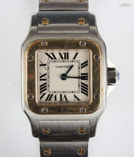 A Cartier Santos Galbée steel and gold lady's bracelet wrist...