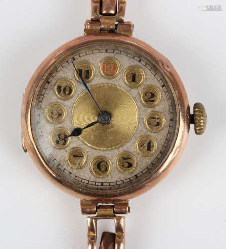 A 9ct gold circular cased lady's wristwatch with unsigned mo...
