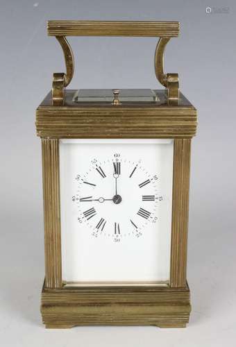 An early 20th century French brass cased carriage clock, the...