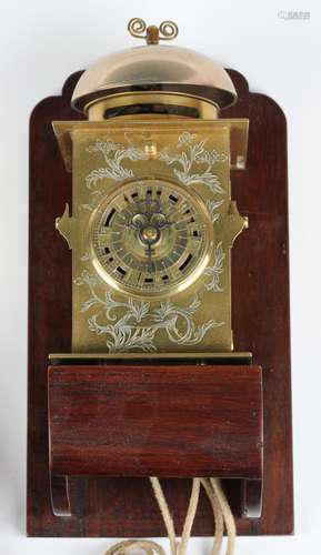 A mid to late 19th century Japanese engraved brass kake-doke...