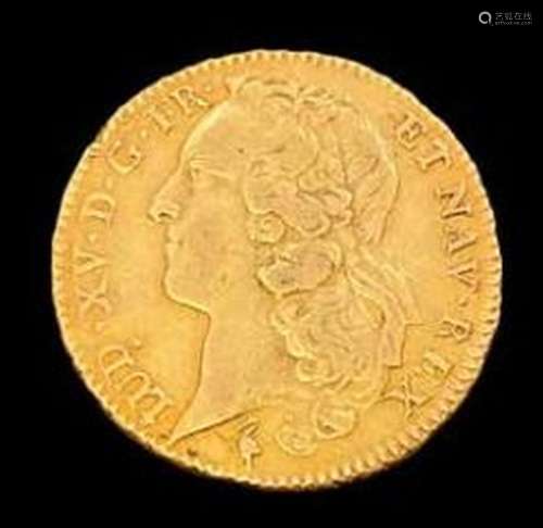 FRANCE<br />
Une pièce en or double Louis XV au bandeau (176...