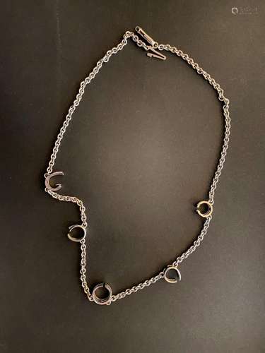 Monture de collier en or gris 18k (750 millièmes).<br />
Poi...