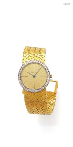 BUECHE-GIROD<br />
Montre bracelet de dame en or jaune et or...