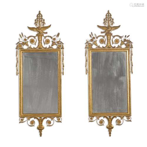 A pair of late George III carved giltwood mirrors, late 18th...