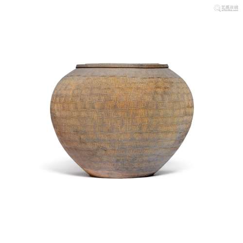 A large impressed-design grey pottery jar, Warring States pe...