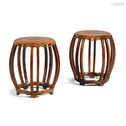A pair of hongmu and burrwood drum stools, Qing dynasty | 清...
