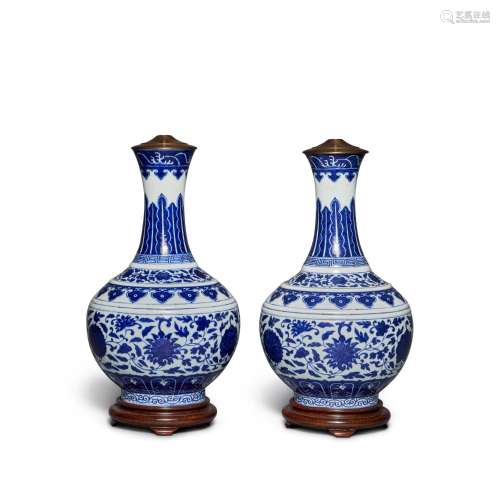 A pair of Ming-style blue and white bottle vases, Marks and ...