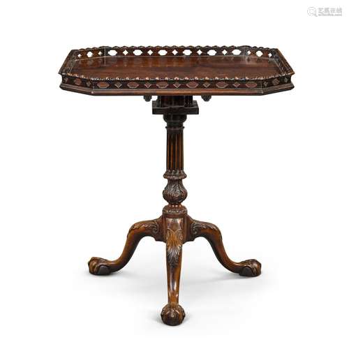 A George II carved mahogany tripod table