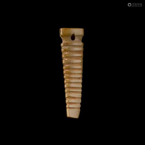 A jade silk worm-form pendant, Possibly Western Zhou dynasty...