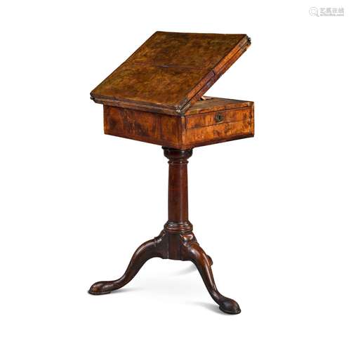 A George I burr walnut-veneered and walnut adjustable writin...