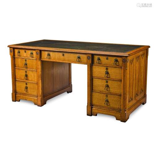 A Victorian carved oak partner`s desk, circa 1855, designed ...