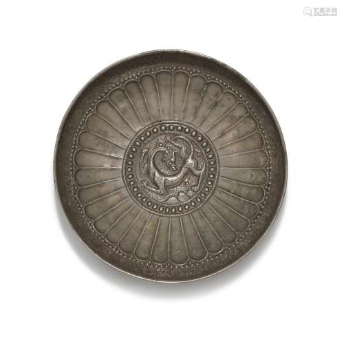 A silver repoussé `dragon` bowl, Central Asia or Tibet, circ...